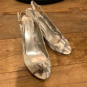 Bandolino woman’s open toe snakeskin heels